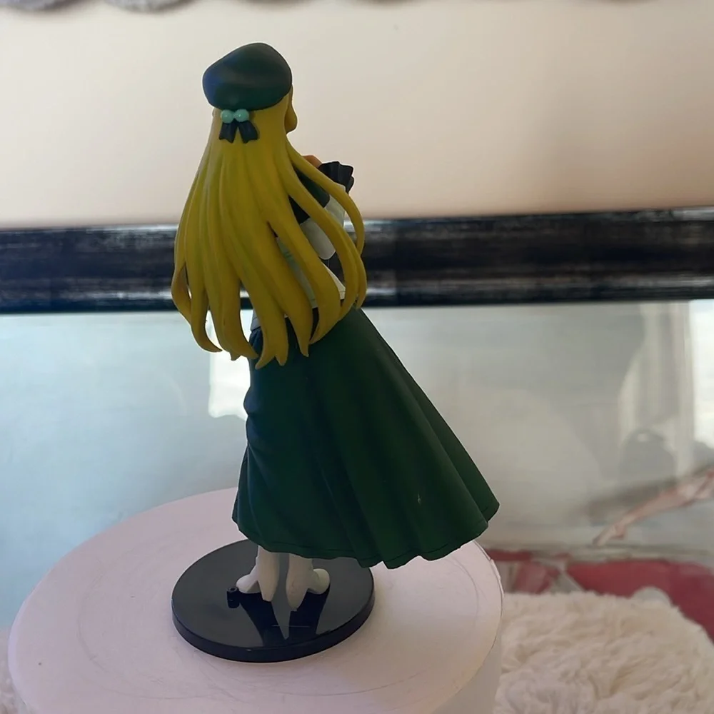 Green and White Anime Figurine
